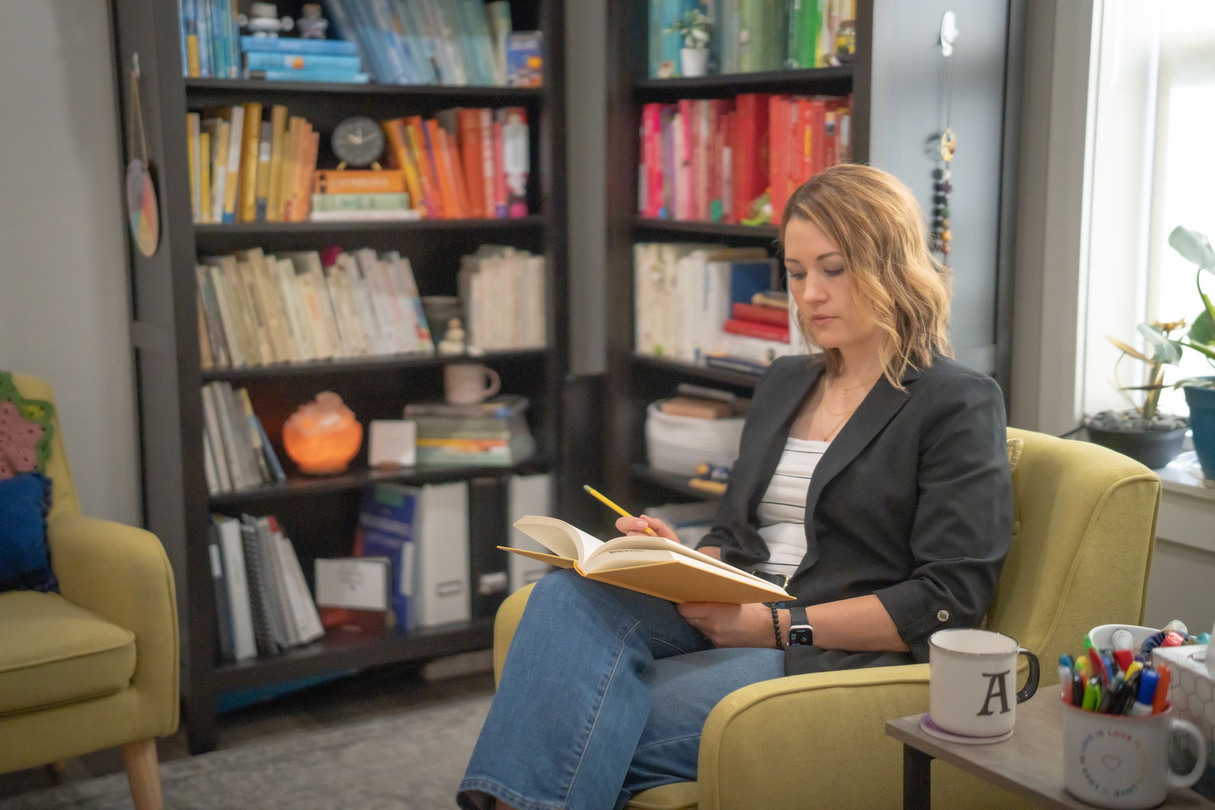 Aly reading in her office in Ammon, Idaho